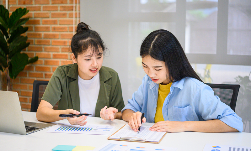 group of business people working and communicating together in t