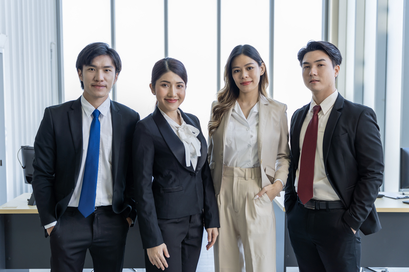 A group of young Asian businessmen